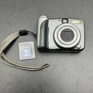 Canon PowerShot A710 IS 7.1 Mega Pixels 6 X Optical Zoom Digital Camera & 4GB SD